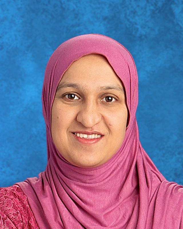 Photo of smiling woman with pink hijaab
